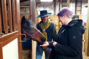 Image of group of people engaging in an arranged activity as part of the Leadership Laramie program, sponsored by the Laramie Chamber Business Alliance.